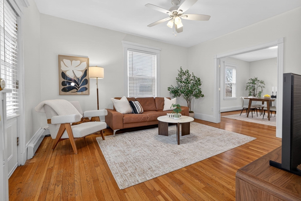 60 Iffley Road, Unit 2 Boston, MA 02130 - Photo 4 of 26 a living room with furniture and a wooden floor