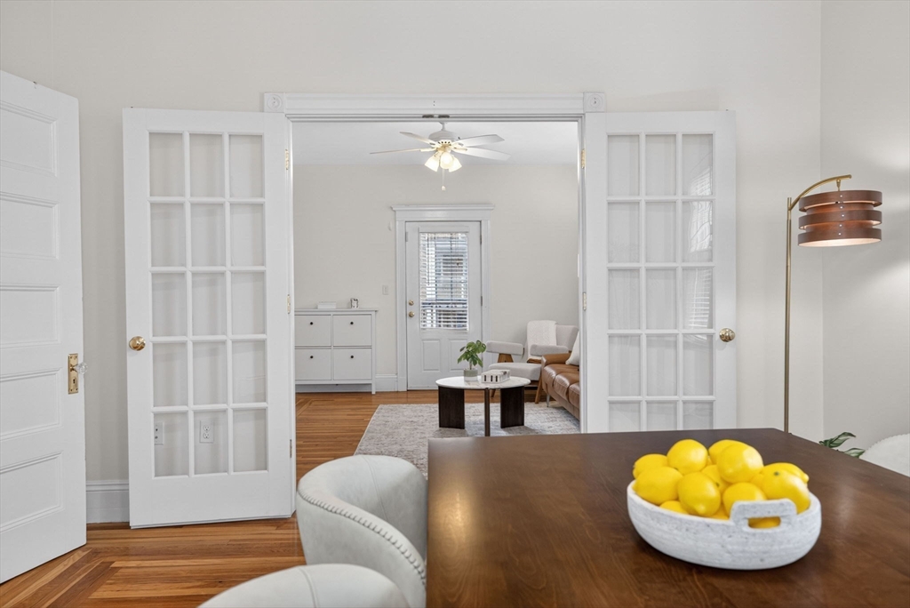 60 Iffley Road, Unit 2 Boston, MA 02130 - Photo 5 of 26 a living room with furniture and a chandelier