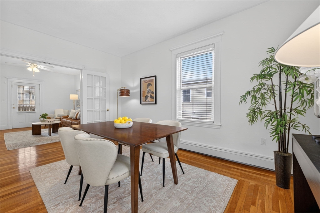 60 Iffley Road, Unit 2 Boston, MA 02130 - Photo 6 of 26 a view of a dining room with furniture and wooden floor