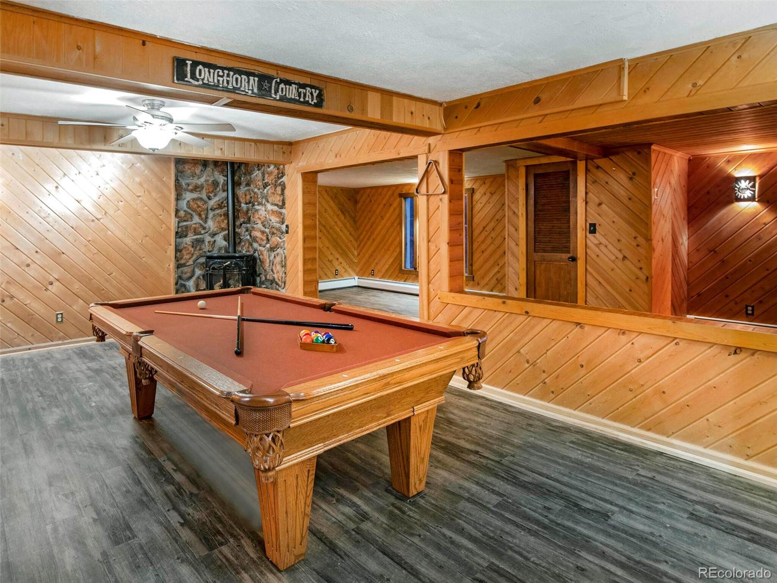 25633 Independence Trail Evergreen, CO 80439 - Photo 16 of 39 a pool table sitting in front of a building