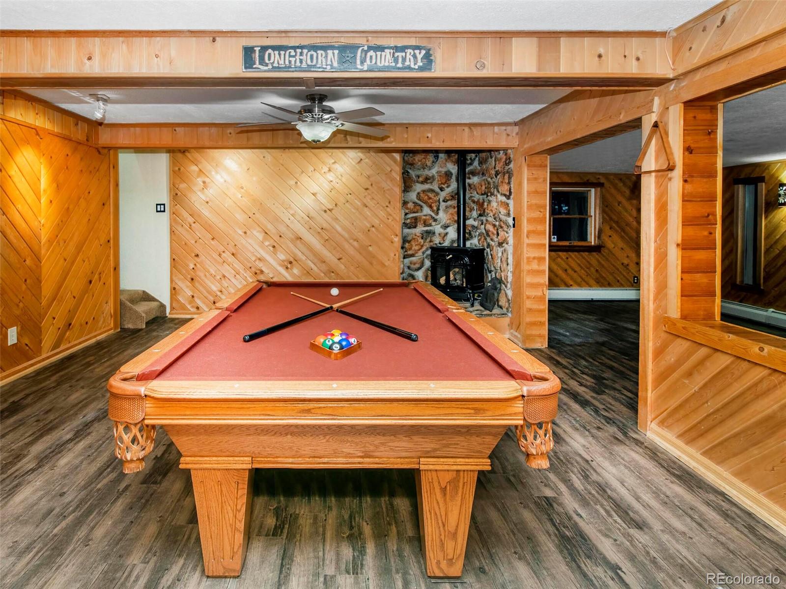 25633 Independence Trail Evergreen, CO 80439 - Photo 25 of 39 a room with pool table and windows