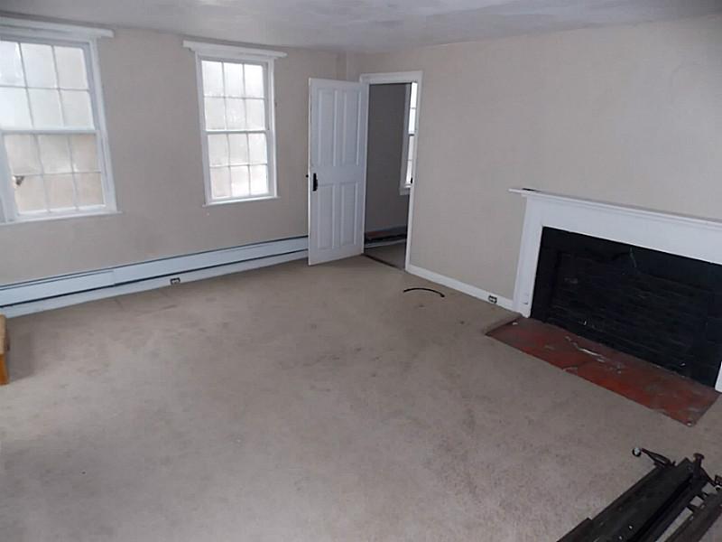 772 Maple Valley Road Coventry, RI 02827 - Photo 15 of 21 Bedroom. Another large bedroom with fireplace.