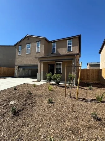 a view of house with backyard porch and furniture