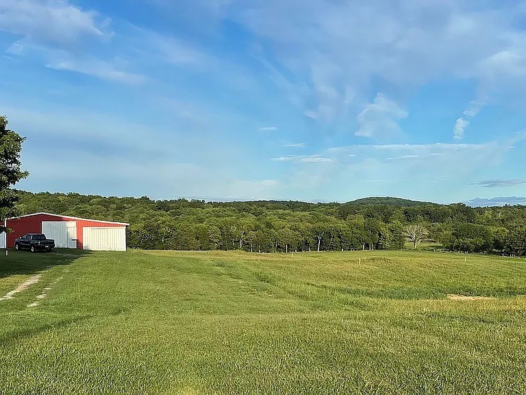 1295 Sugar Flat Road Lebanon, TN 37087 - Photo 4 of 30 a view of a field with an ocean