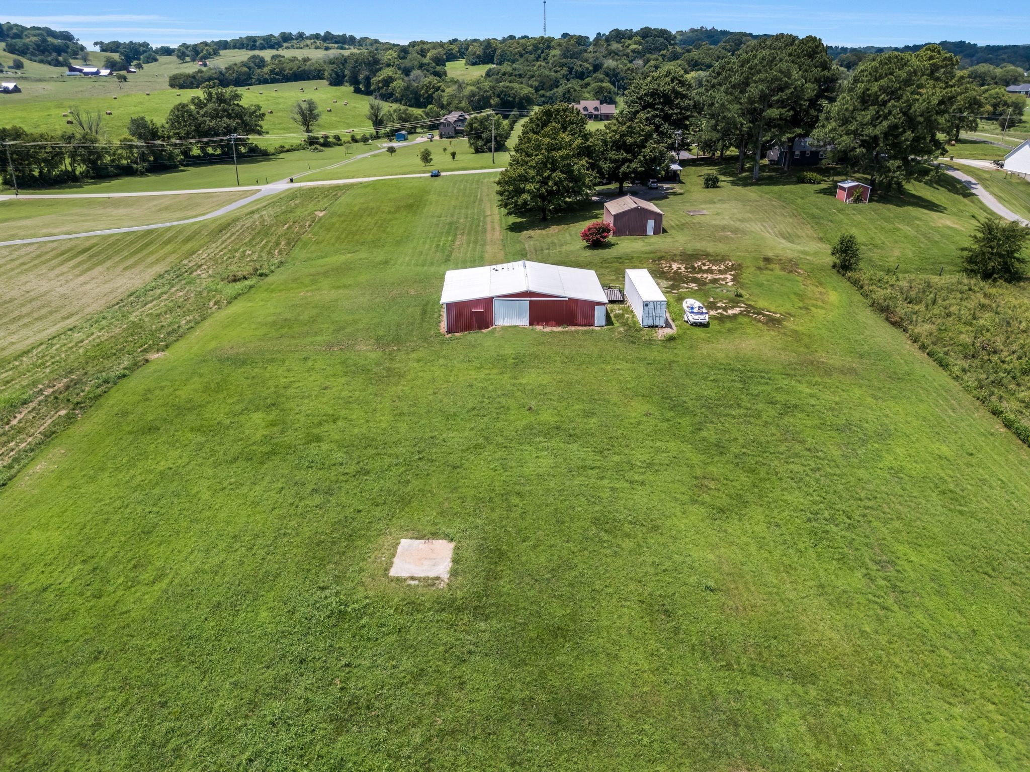 1295 Sugar Flat Road Lebanon, TN 37087 - Photo 8 of 30 a backyard of a house with lots of green space