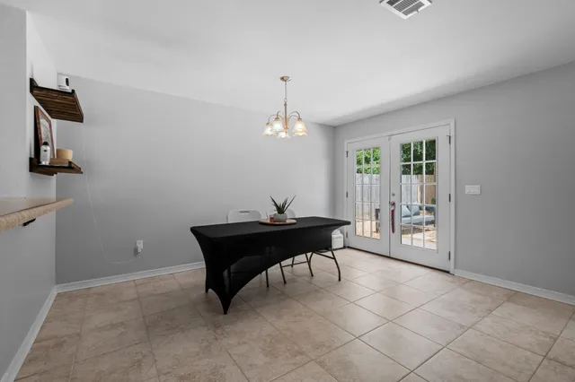a bathroom with a toilet sink and a window