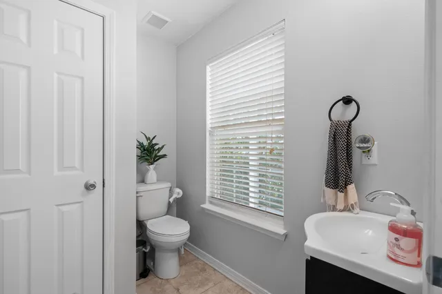 a view of a hallway with a chandelier