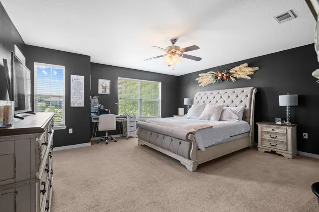 a view of backyard with a patio