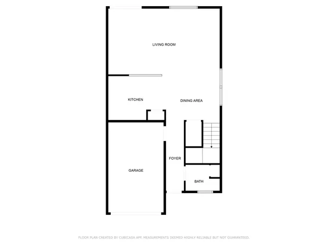 a view of a backyard with sitting area