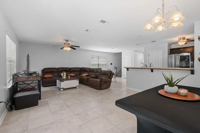 a kitchen with a sink stove and microwave