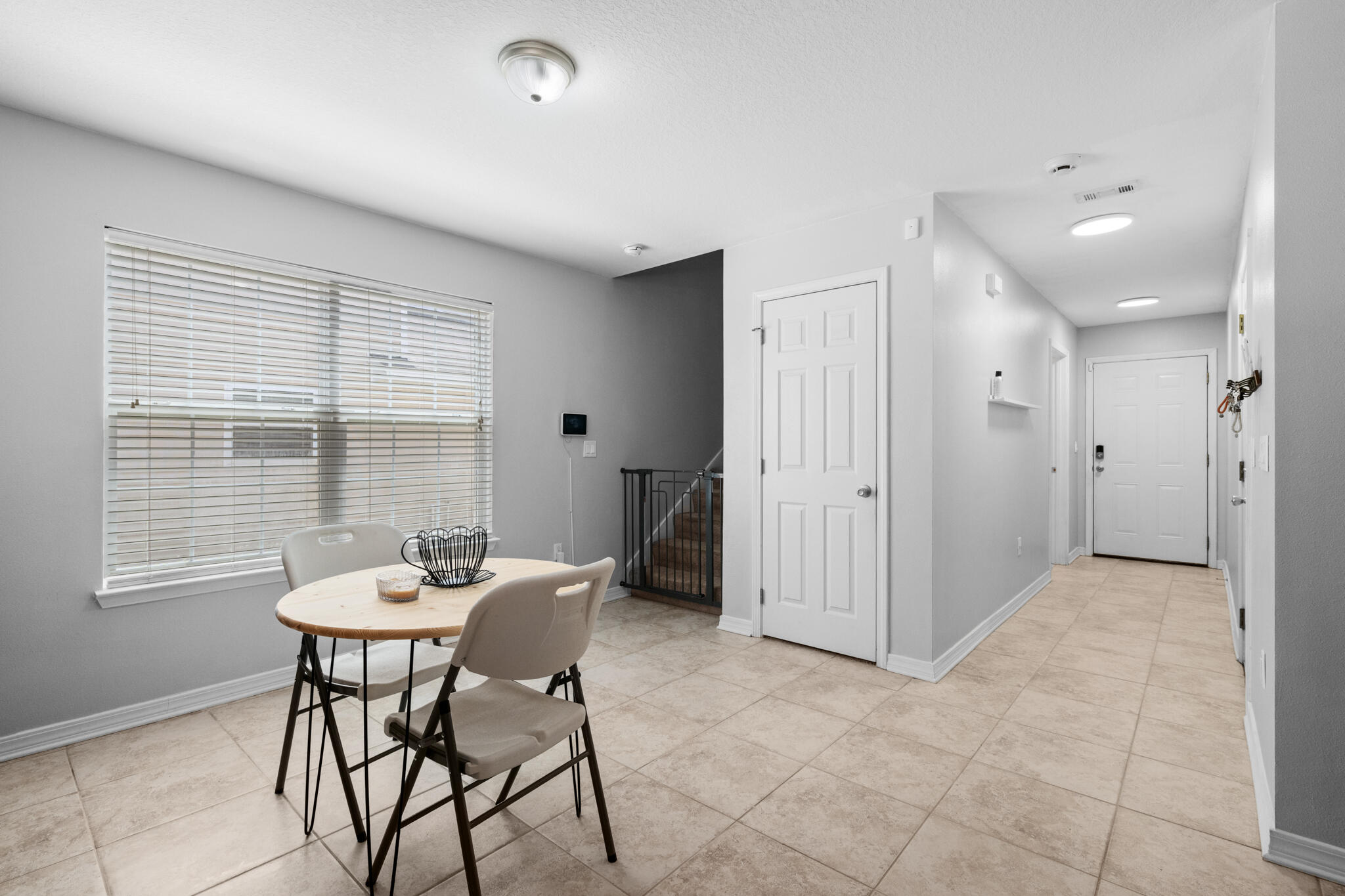 104 Lear Court Crestview, FL 32539 - Photo 10 of 27 a view of a dining room with furniture and a window