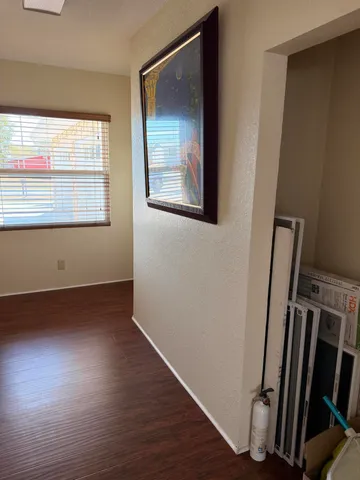 a view of outdoor space with green field and trees