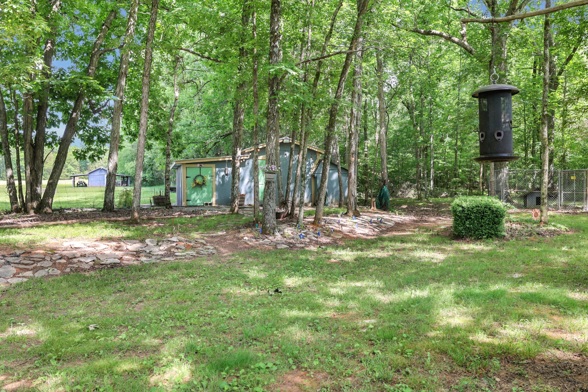 7797 Murfreesboro Road Lebanon, TN 37090 - Photo 12 of 57 a view of backyard with tree and green space