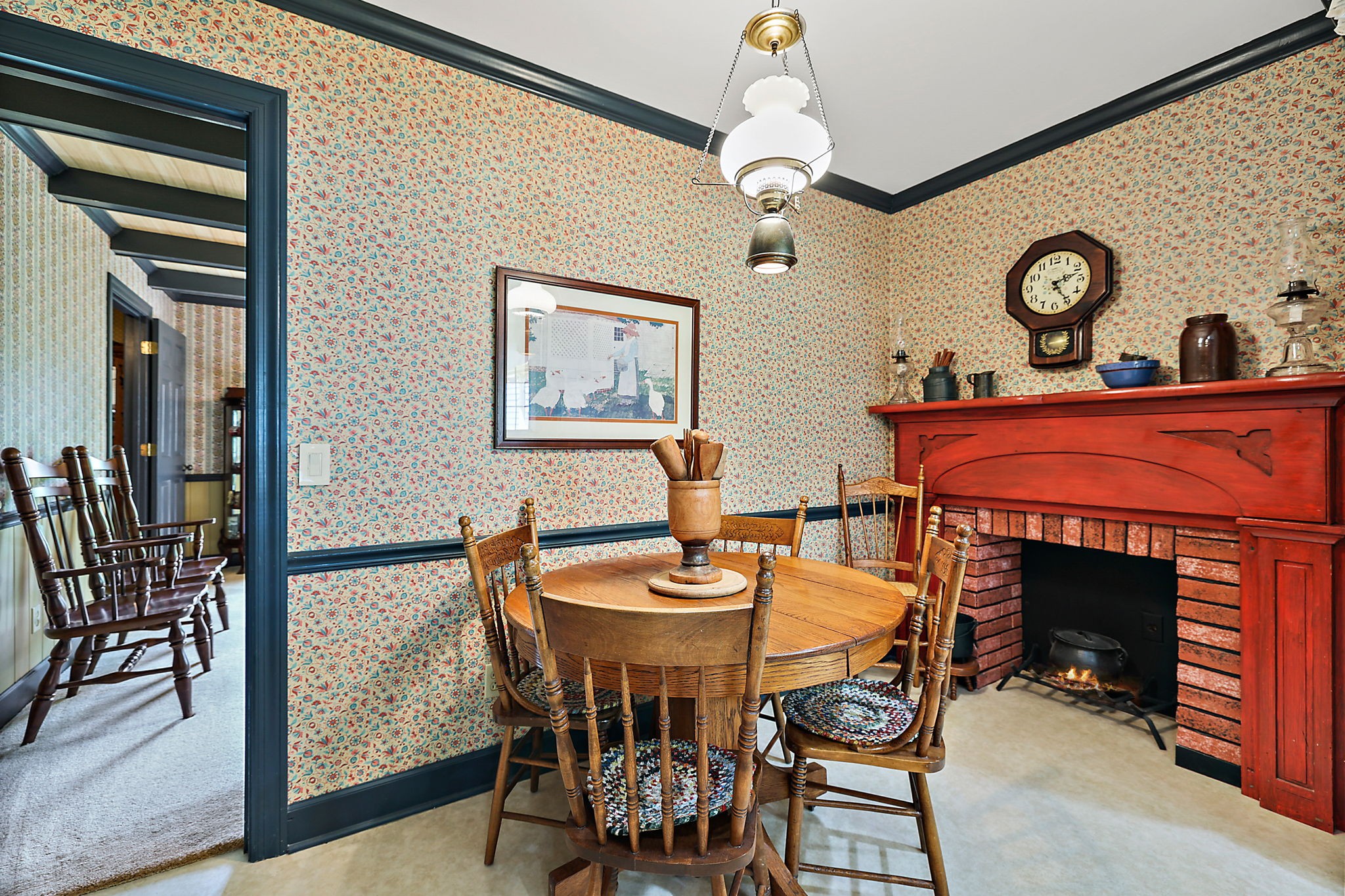 7797 Murfreesboro Road Lebanon, TN 37090 - Photo 29 of 57 a dining room with furniture and a fireplace