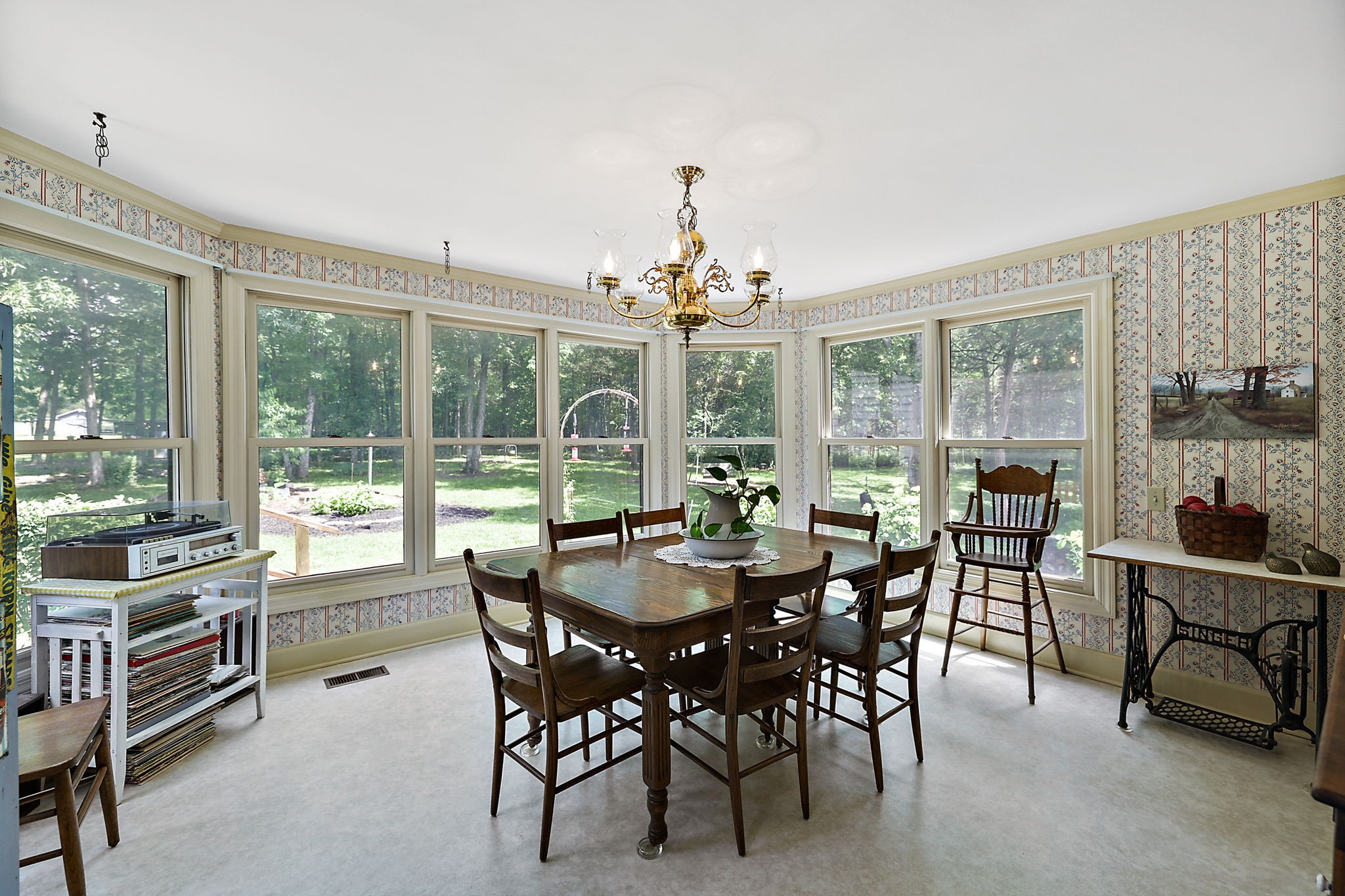 7797 Murfreesboro Road Lebanon, TN 37090 - Photo 30 of 57 a view of a dining room with furniture large windows and wooden floor