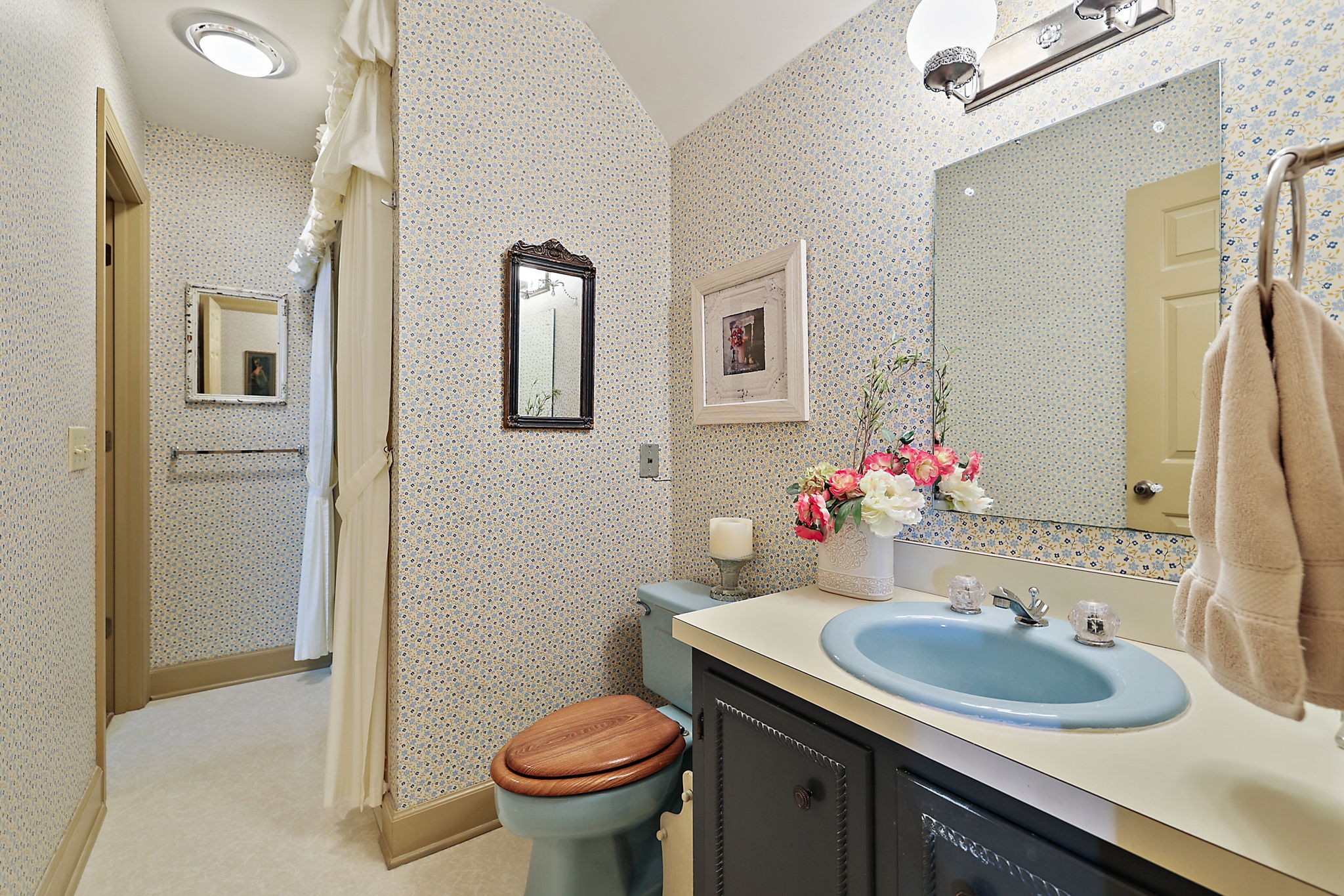 7797 Murfreesboro Road Lebanon, TN 37090 - Photo 39 of 57 a bathroom with a sink vanity mirror and toilet