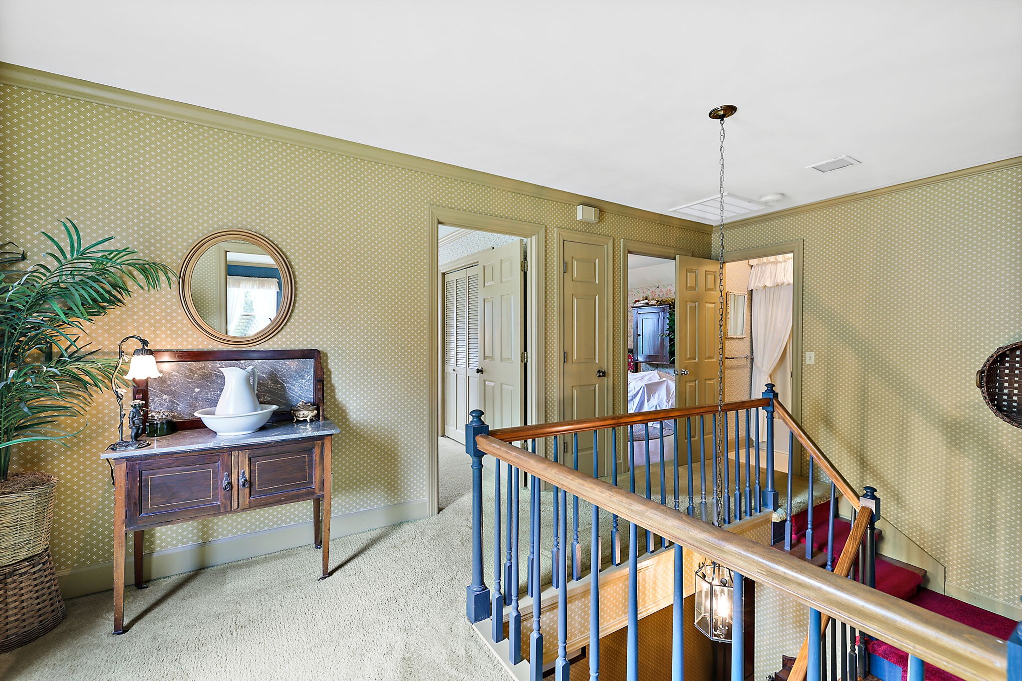 7797 Murfreesboro Road Lebanon, TN 37090 - Photo 40 of 57 a view of a hallway with wooden floor and windows