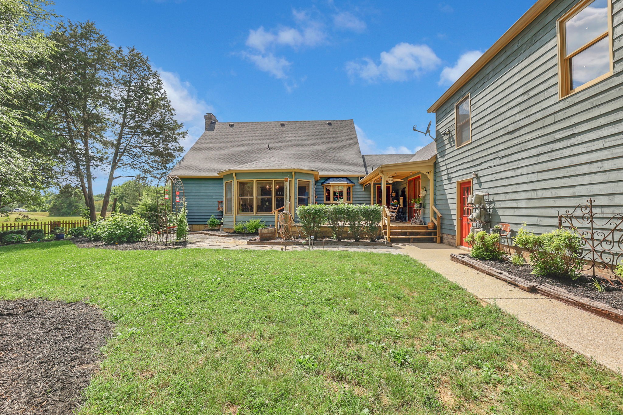 7797 Murfreesboro Road Lebanon, TN 37090 - Photo 49 of 57 a front view of a house with yard and green space