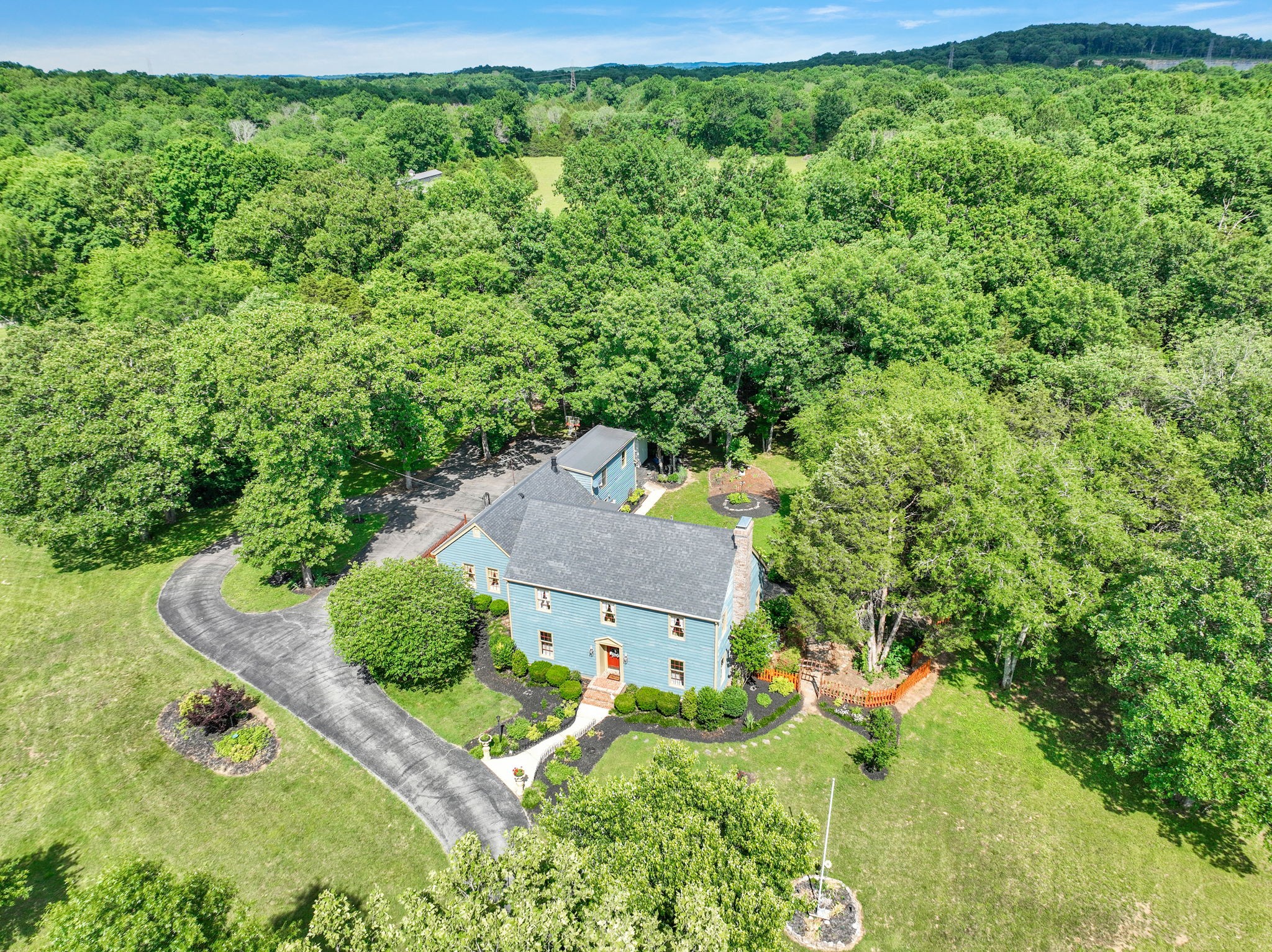 7797 Murfreesboro Road Lebanon, TN 37090 - Photo 55 of 57 an aerial view of a house with a yard