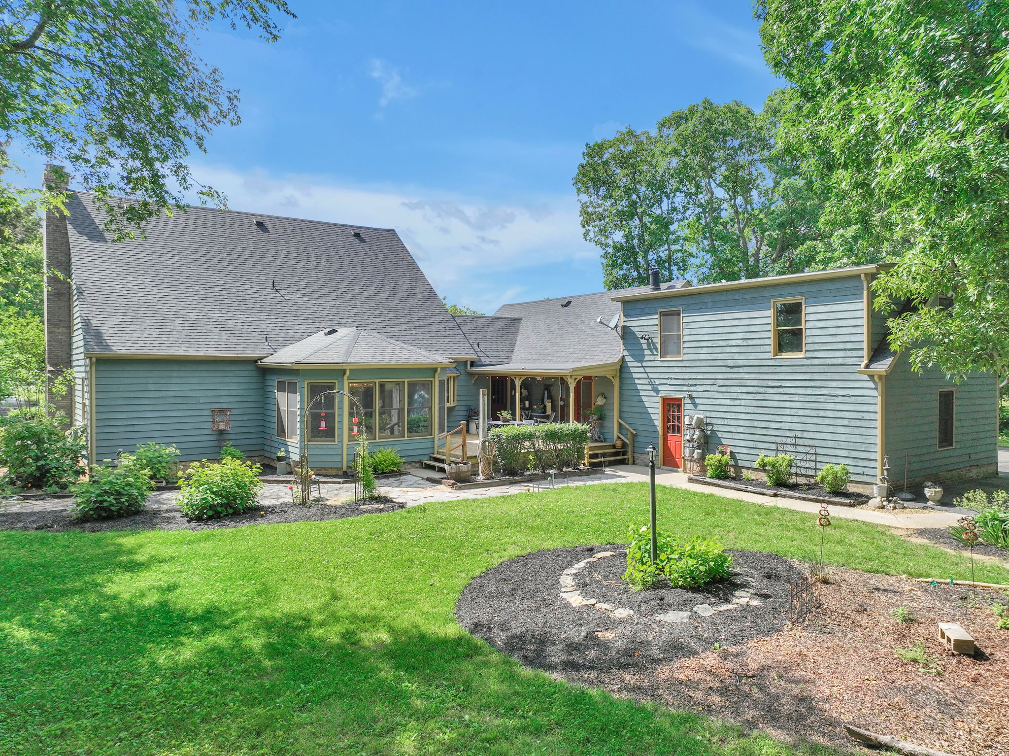 7797 Murfreesboro Road Lebanon, TN 37090 - Photo 6 of 57 a front view of a house with a yard and garage