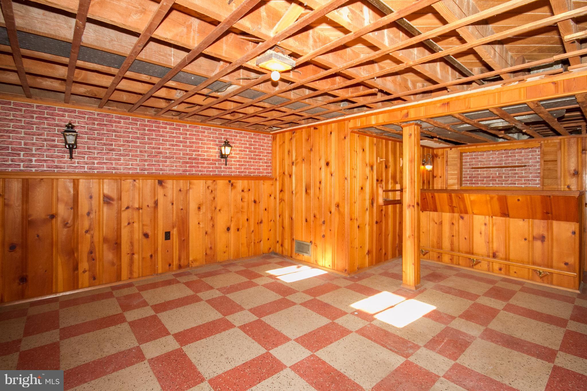 136 Garden Ridge Road Baltimore, MD 21228 - Photo 20 of 25 a view of a room with a black white door