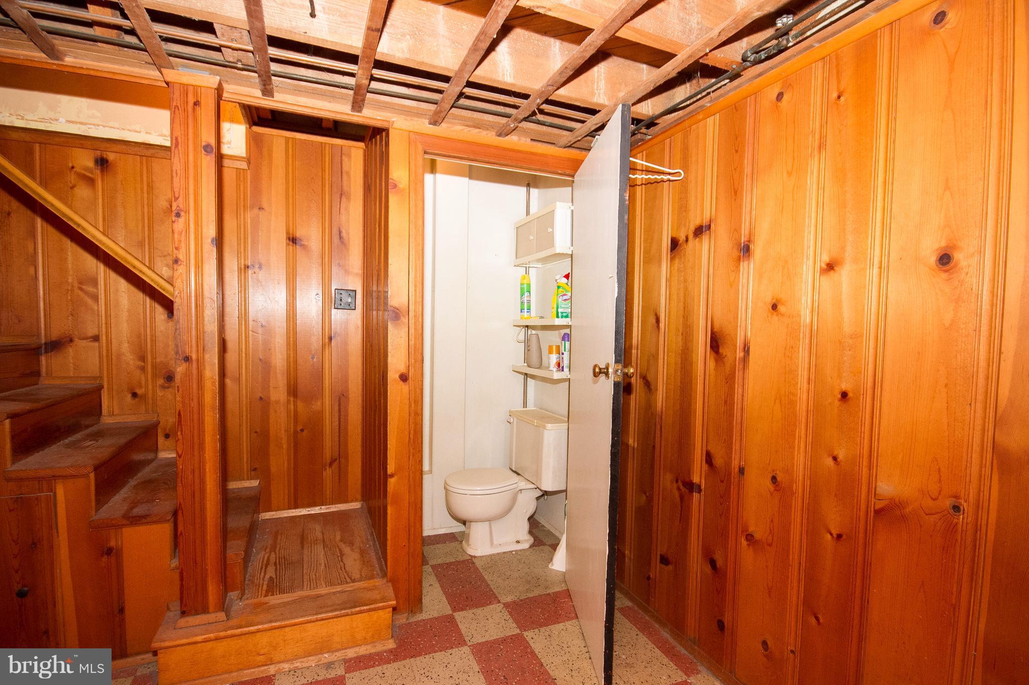 136 Garden Ridge Road Baltimore, MD 21228 - Photo 22 of 25 a bathroom with a shower and a toilet