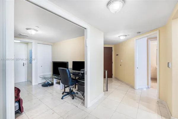 a view of workspace with lounge chair