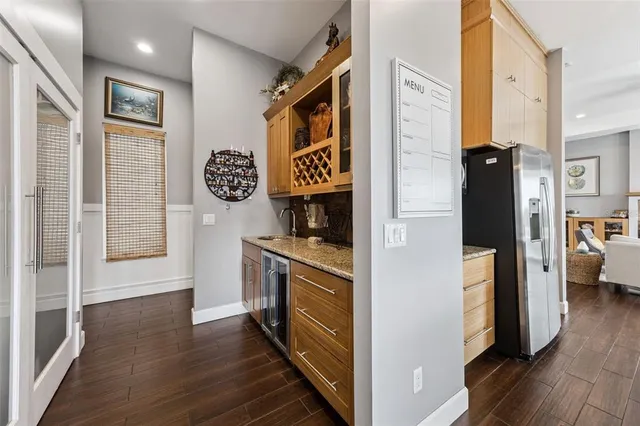 a bedroom with a bed and a table