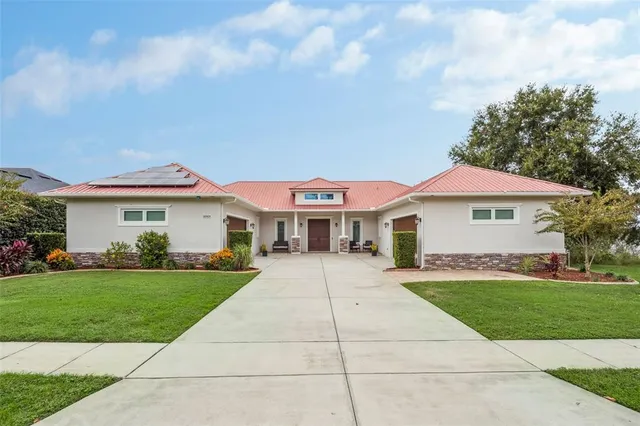 a front view of a house with yard