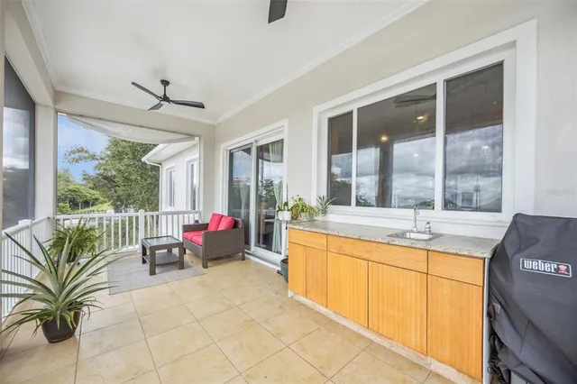 an aerial view of house with swimming pool outdoor seating and yard