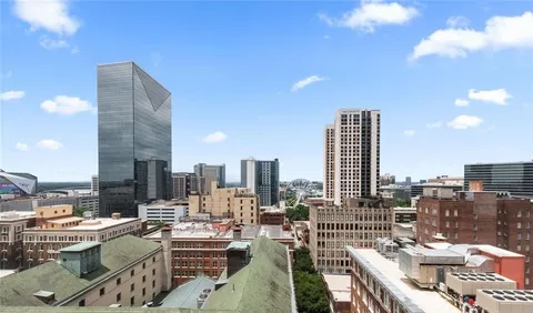 a view of city with tall buildings