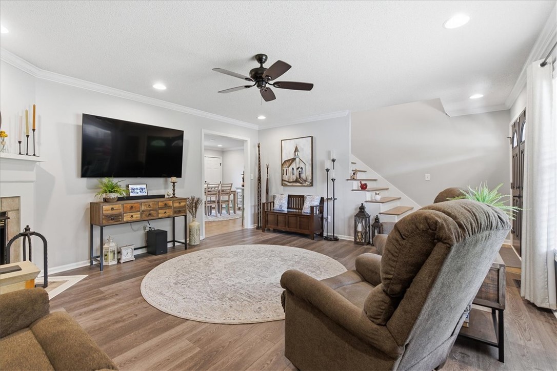 166 Amberwood Drive Anderson, SC 29621 - Photo 4 of 38 This inviting living area boasts rich hardwood floors and abundant natural light, perfect for relaxation.