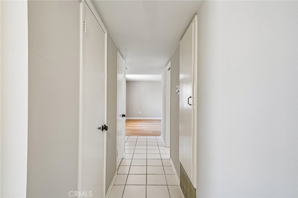 28901 Carmel Road Menifee, CA 92586 - Photo 5 of 47 View of hallway to bed and bathrooms