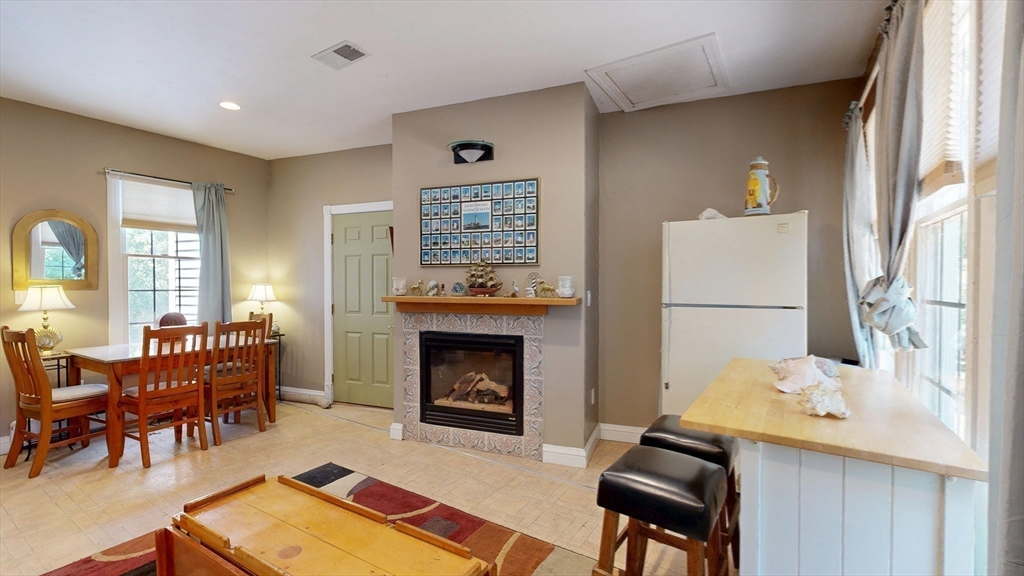 40 Country Club Drive Bridgewater, MA 02324 - Photo 15 of 39 a living room with furniture and a fireplace