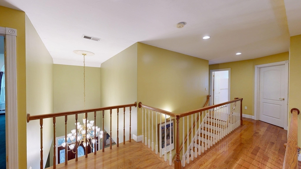 40 Country Club Drive Bridgewater, MA 02324 - Photo 28 of 39 a view of a hallway with wooden floor