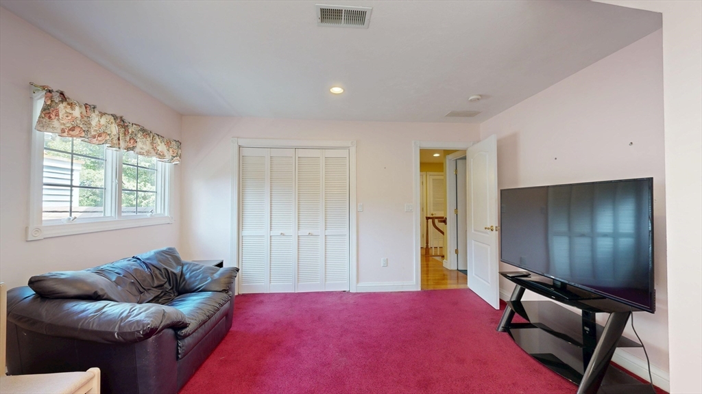 40 Country Club Drive Bridgewater, MA 02324 - Photo 30 of 39 a living room with furniture and a window