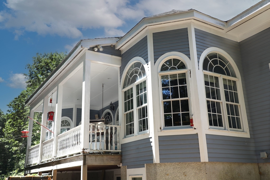 40 Country Club Drive Bridgewater, MA 02324 - Photo 34 of 39 a front view of a house with a balcony