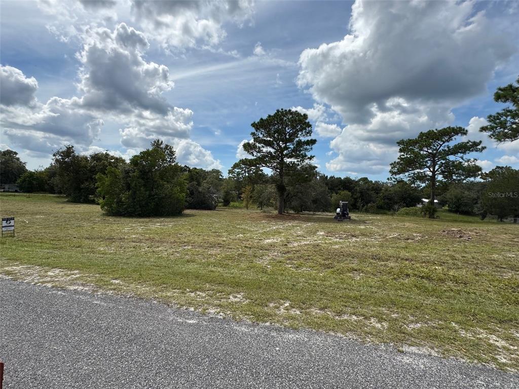 Indian Trail Road Weeki Wachee, FL 34613 - Photo 2 of 13 a view of a field with an ocean