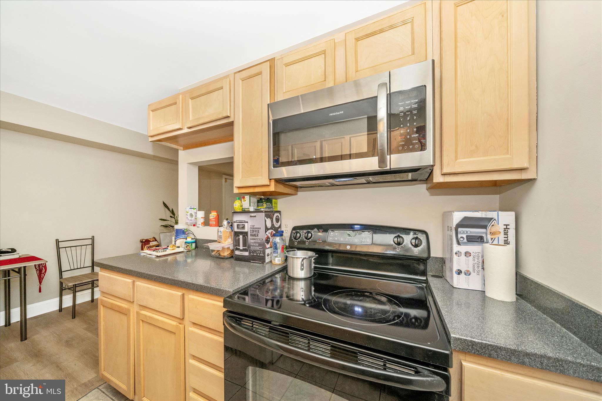1320 Missouri Avenue Northwest, Unit 203 Washington, DC 20011 - Photo 13 of 37 a kitchen with a stove and a sink