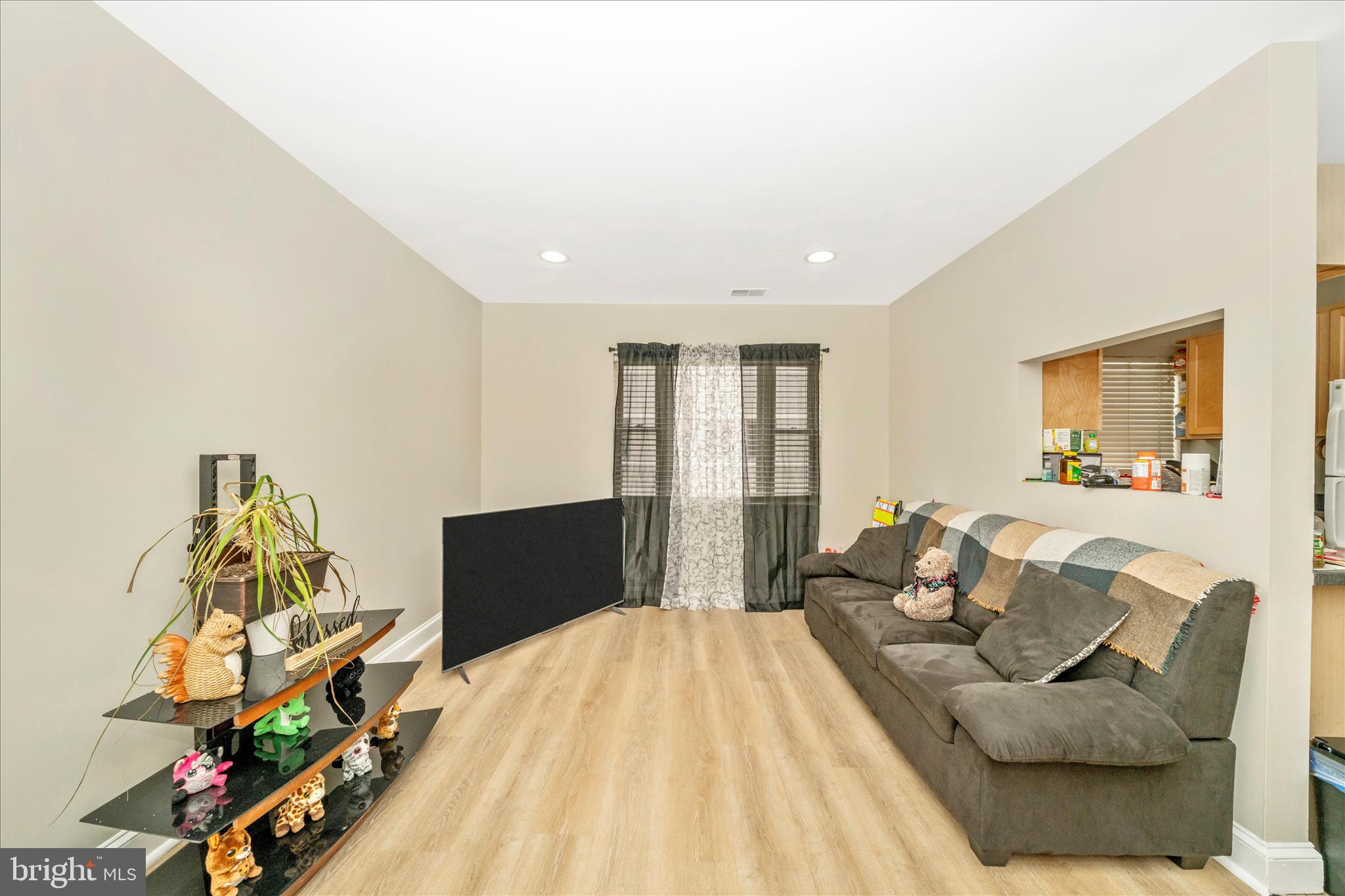 1320 Missouri Avenue Northwest, Unit 203 Washington, DC 20011 - Photo 6 of 37 a spacious bedroom with a bed and a couch