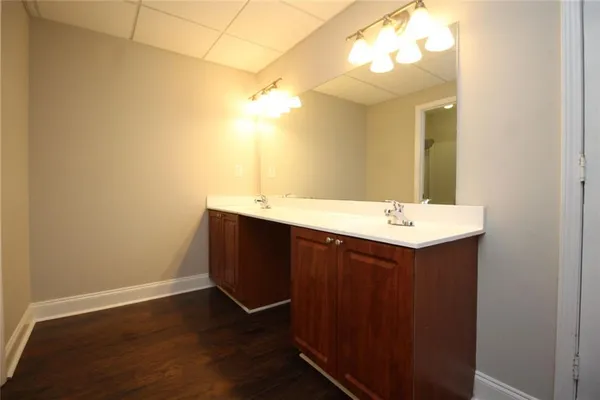 a bathroom with a shower and a toilet