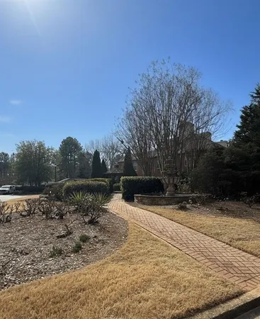 a view of a swimming pool with a garden