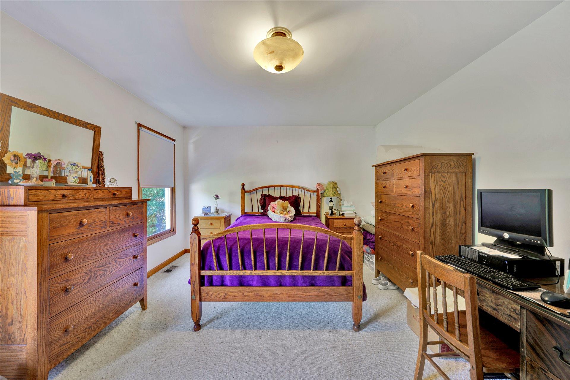 1401 Treasure Lane Blue Ridge, VA 24064 - Photo 11 of 23 a bedroom with a bed and a television
