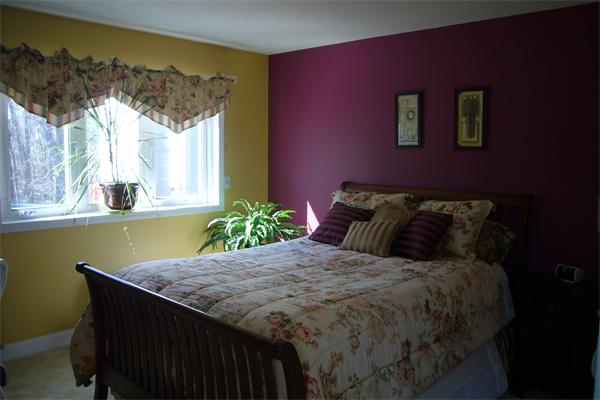 21 Autumn Road Medway, MA 02053 - Photo 11 of 13 a bed sitting in a bedroom next to a window