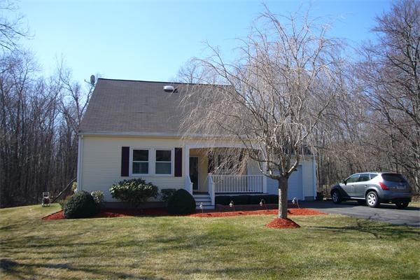 21 Autumn Road Medway, MA 02053 - Photo 2 of 13 a front view of a house with a yard
