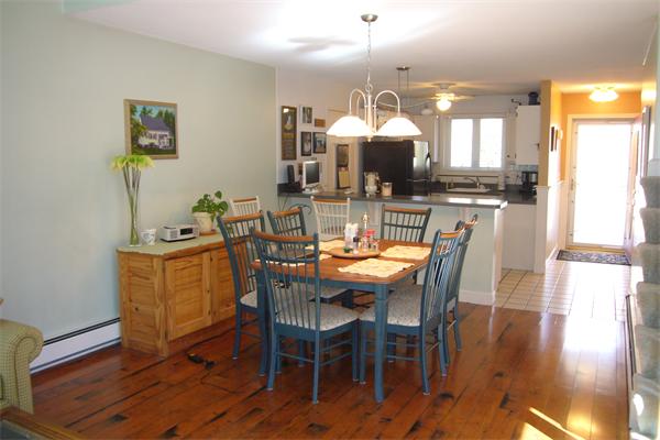 21 Autumn Road Medway, MA 02053 - Photo 10 of 13 a view of a dining room with furniture and wooden floor