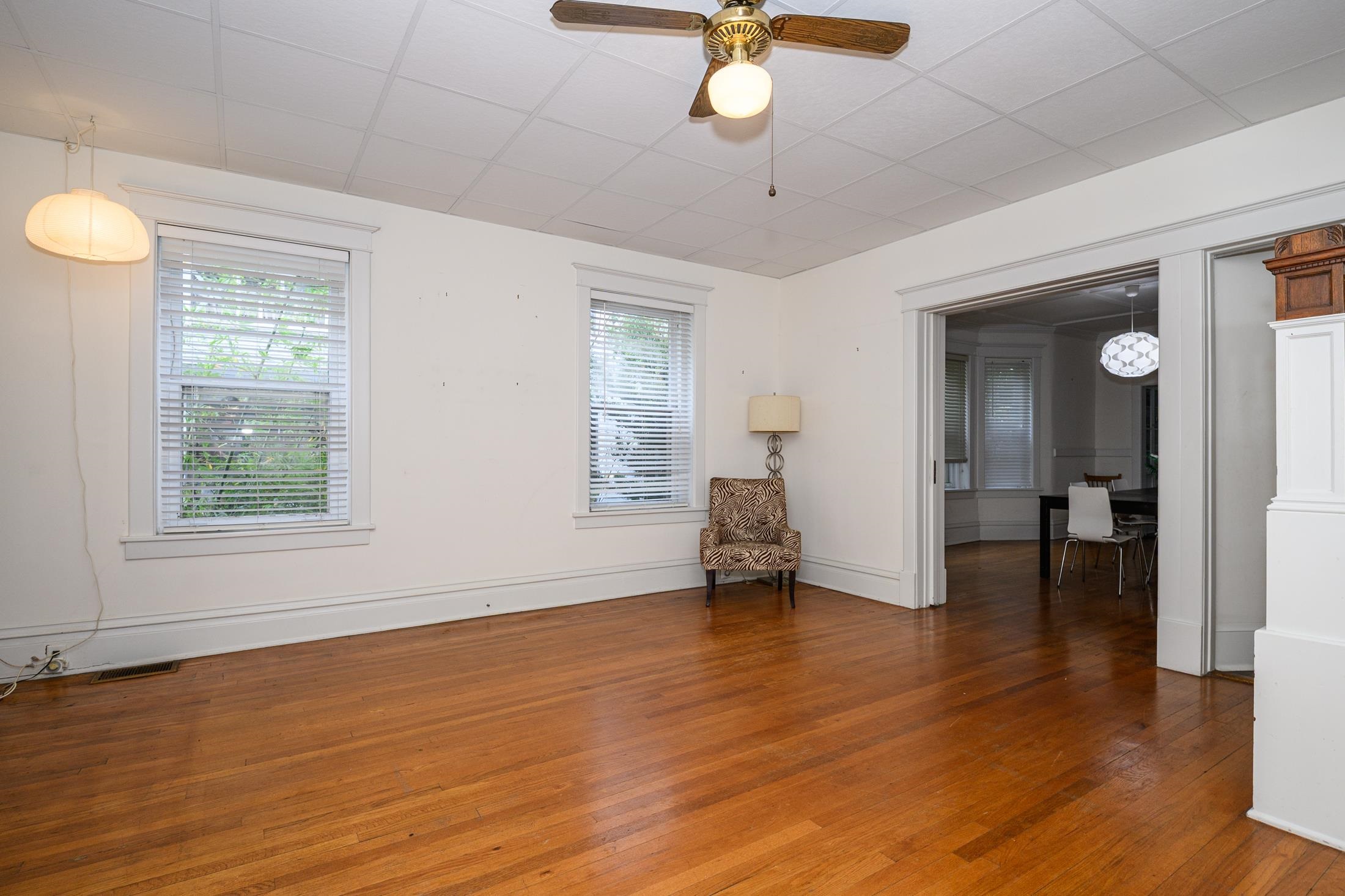 24 Saragossa Street St. Augustine, FL 32084 - Photo 53 of 99 a view of an empty room with wooden floor and a window