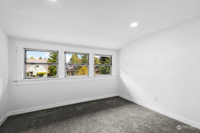 a bathroom with a bathtub and a sink