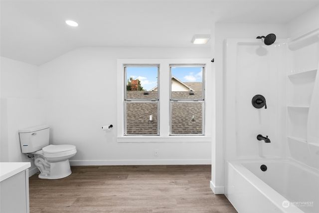 a view of an empty room with stairs