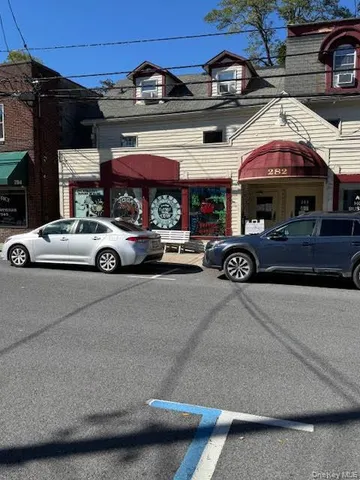 a car parked in front of a building